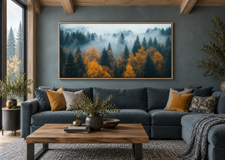 Moody Foggy Forest Framed Canvas Wall Art above a blue sectional in a rustic living room.