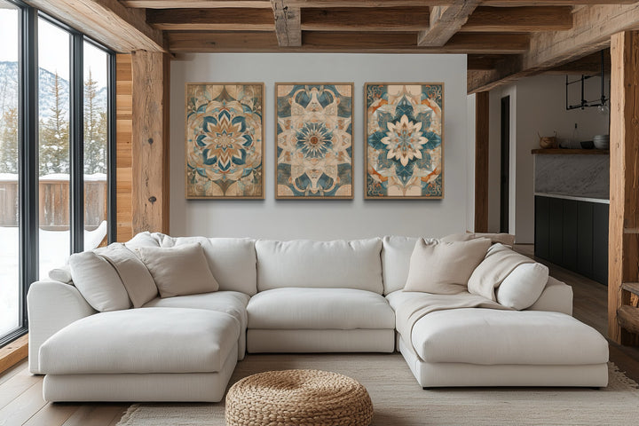 Set of 3 framed boho neutral mandala wall art pieces hanging above a white sectional sofa.