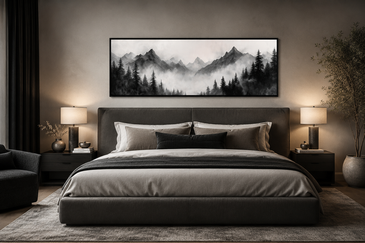 Black and white watercolor foggy mountain forest long horizontal wall art above a bed.