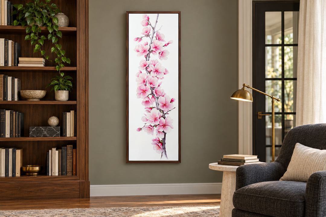 Vertical framed canvas wall art featuring pink watercolor cherry blossoms on a white background.