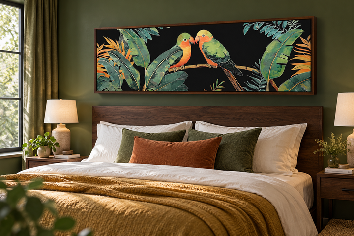 Lovebirds in tropical rainforest long horizontal framed canvas wall art hanging above a bed.