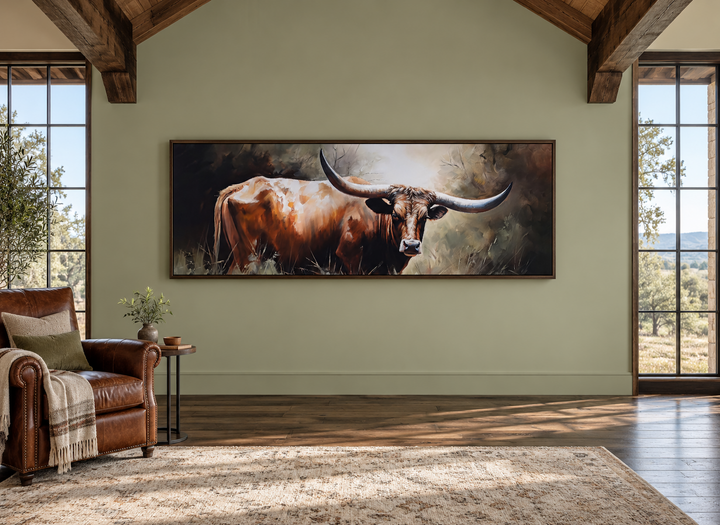 Texas Longhorn Steer panoramic framed canvas wall art in a rustic living room setting.
