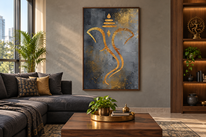 Minimalist Lord Ganesha framed canvas wall art in grey and gold hanging in a modern living room.