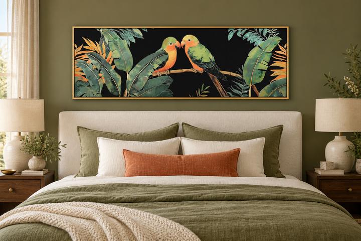 Lovebirds in tropical rainforest long horizontal framed canvas wall art above a bed.