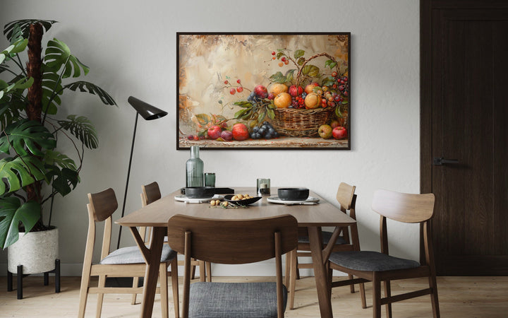 Framed rustic fruit basket canvas wall art hanging in a modern farmhouse dining room.