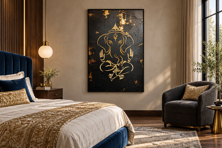 Minimalist black and gold Lord Ganesha framed canvas wall art hanging in a modern bedroom.