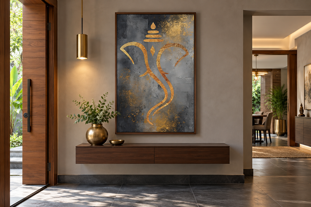 Grey and gold minimalist Lord Ganesha framed canvas wall art in a modern home entryway.