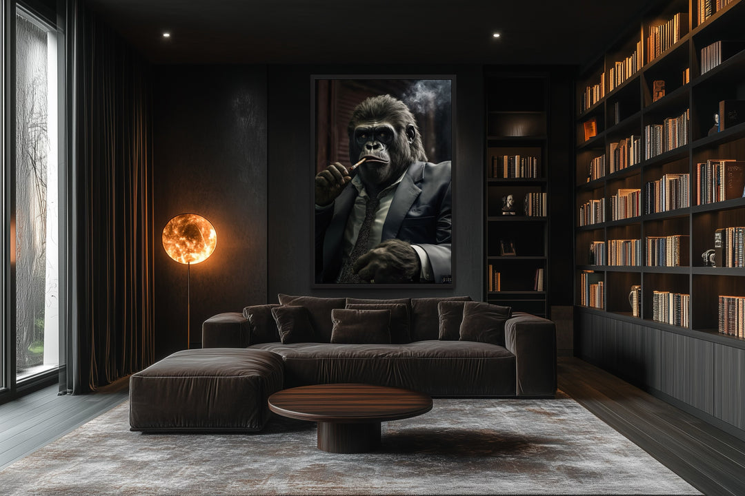 Framed canvas wall art of a gorilla in a suit smoking a cigar, hung in a dark modern office.