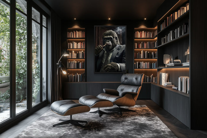 Framed canvas wall art of a gorilla in a suit smoking a cigar, hung in a dark modern office.