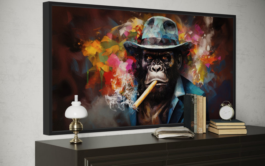 Gangster gorilla in a fedora and suit smoking a cigar canvas wall art above a dark wood dresser.