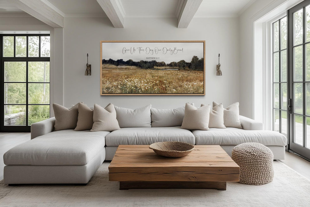 Horizontal landscape wall art featuring Matthew 6:11 scripture over a rustic wildflower field.