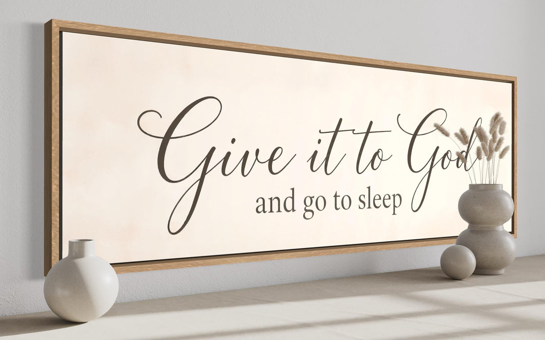 Long horizontal wall art with 'Give it to God and go to sleep' in elegant script and serif fonts.