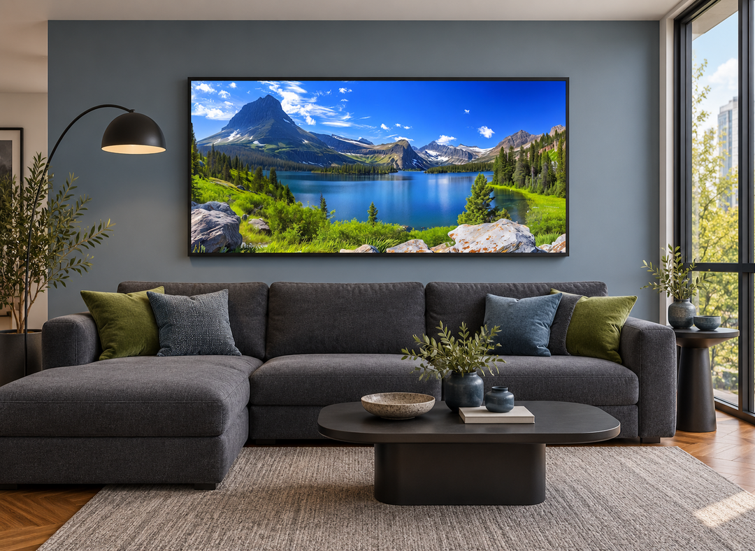 Framed canvas print of Glacier National Park landscape above a modern sectional sofa.