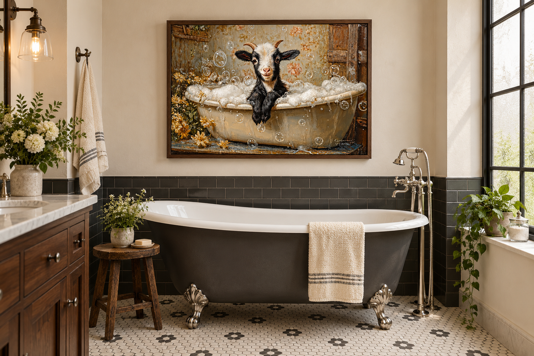 Goat in a Bathtub Framed Canvas Wall Art hanging above a charcoal clawfoot tub in a rustic bathroom.