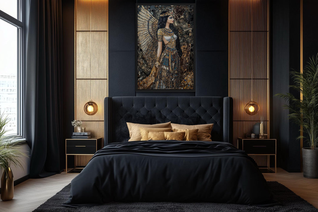 Goddess Isis mosaic-style framed canvas wall art hanging above a black tufted bed in a bedroom.