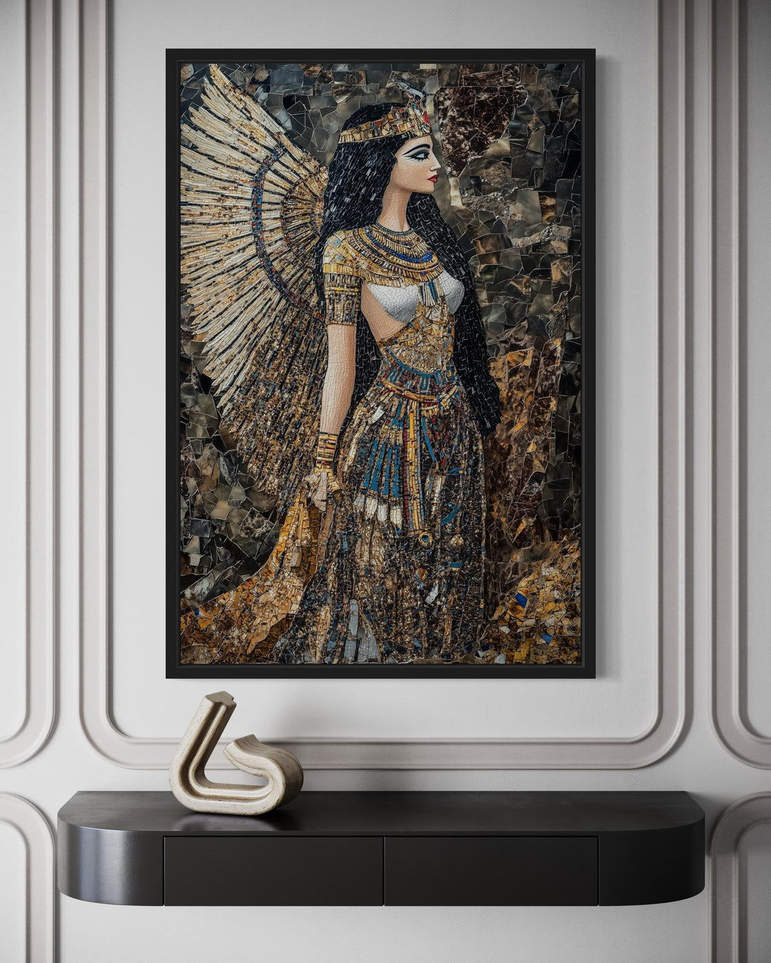 Goddess Isis mosaic-style framed canvas wall art above a black console table.