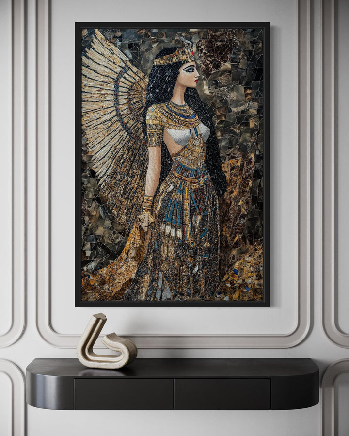 Goddess Isis mosaic-style framed canvas wall art above a black console table.