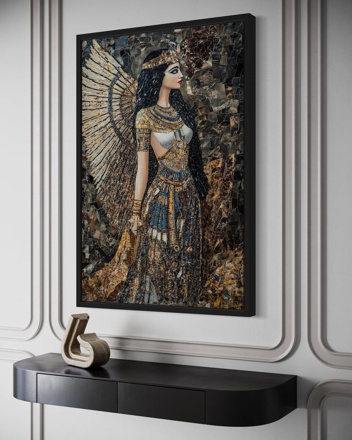 Goddess Isis mosaic-style framed canvas wall art hanging above a black console table.