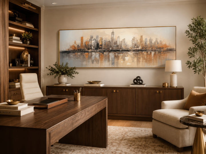 Horizontal abstract gold and silver New York City skyline wall art in a modern home office.