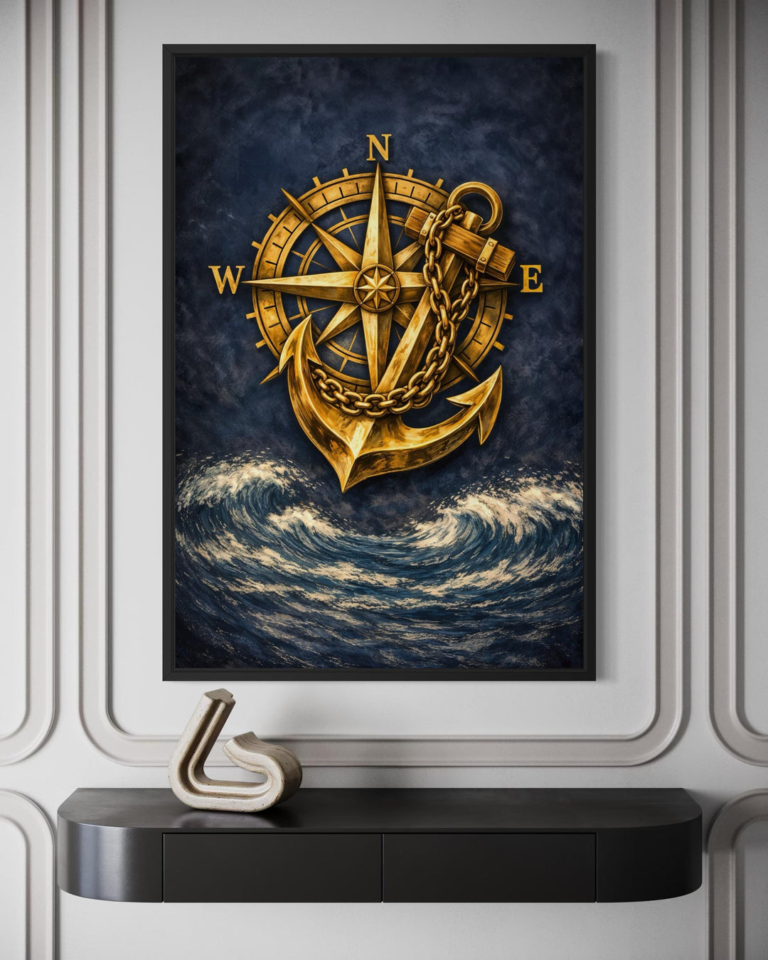 Framed canvas wall art featuring a golden compass and anchor over dark navy blue ocean waves.