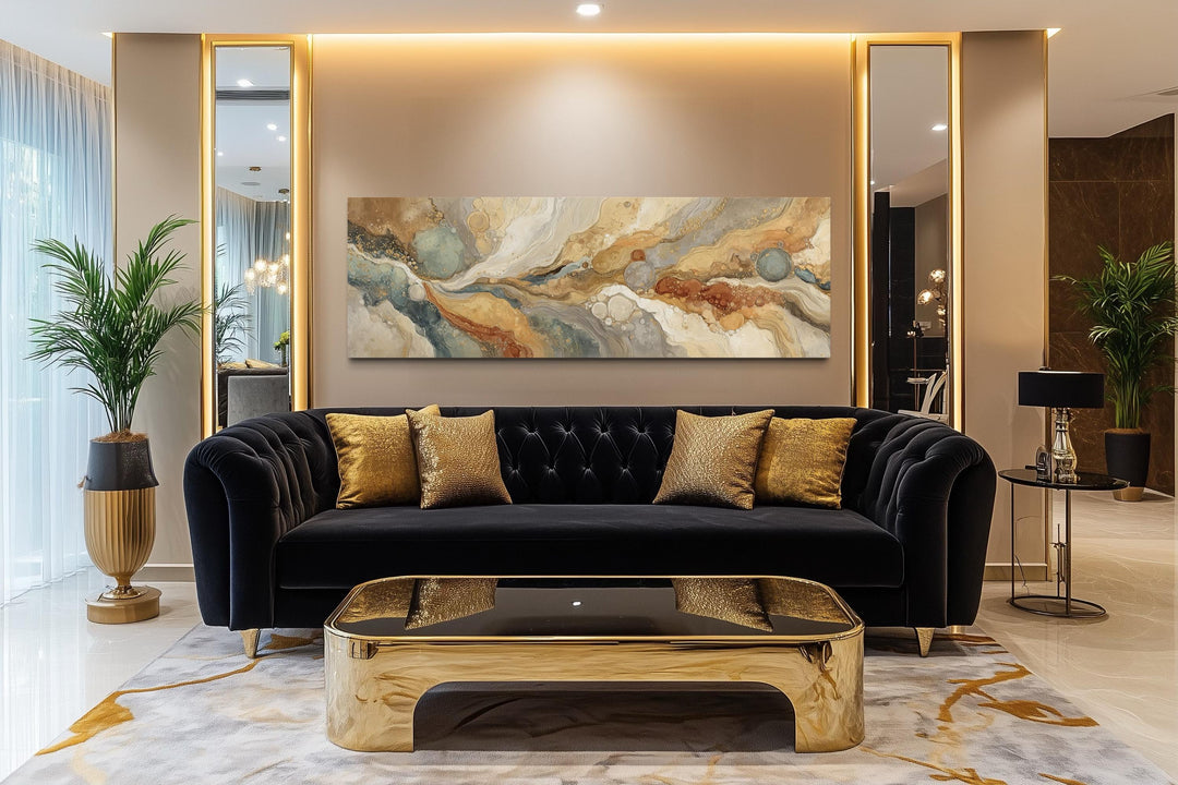 Gold and grey abstract marble canvas wall art displayed above a black sofa in a modern living room.