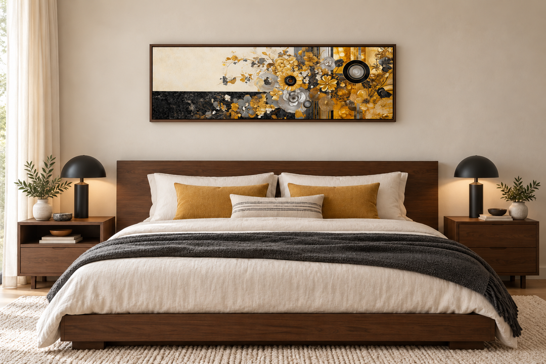 Long horizontal abstract wall art with gold, silver, and black floral motifs above a wooden bed.
