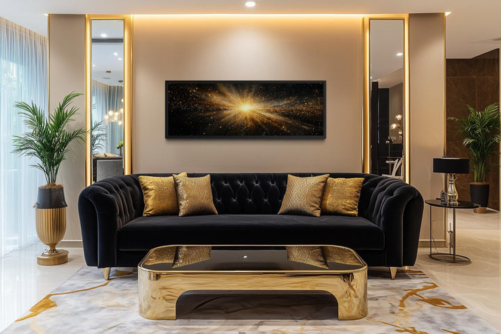 Horizontal abstract wall art featuring a radiant gold starburst explosion on a black background.