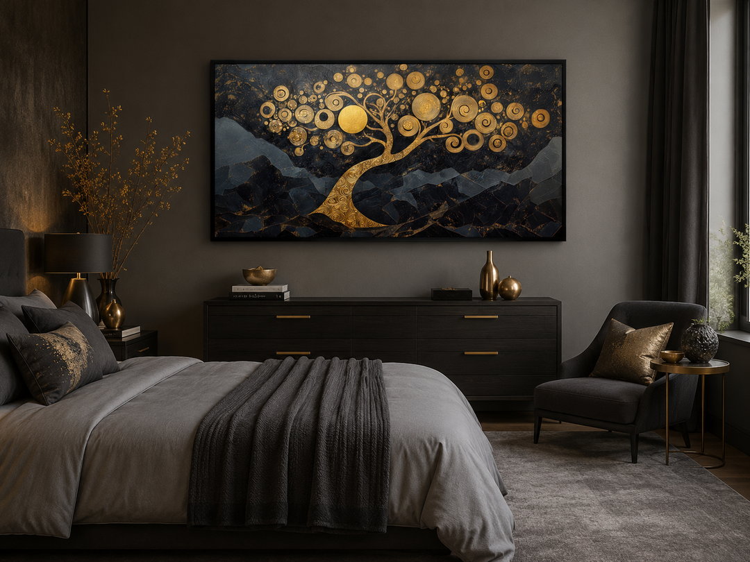 Gold tree of life wall art with swirling branches on a black background above a bedroom dresser.