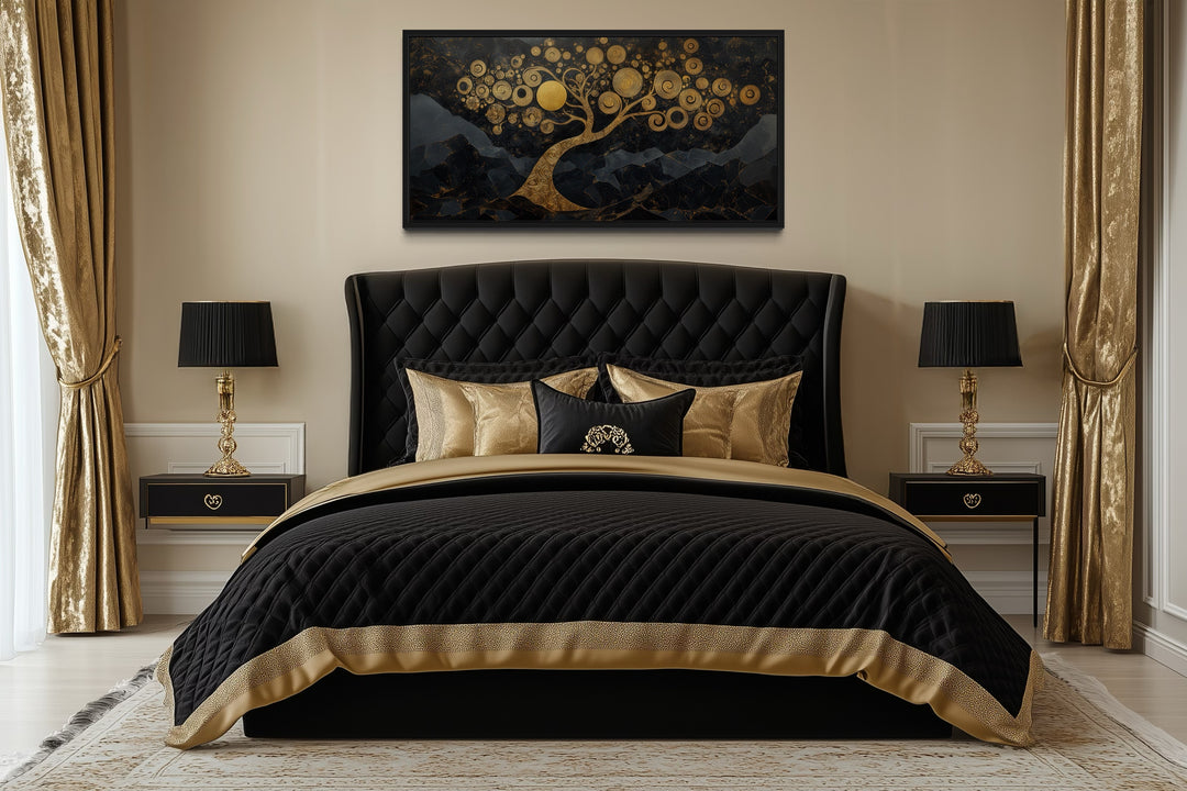 Gold Tree of Life wall art on black background hanging above a black and gold tufted bed.