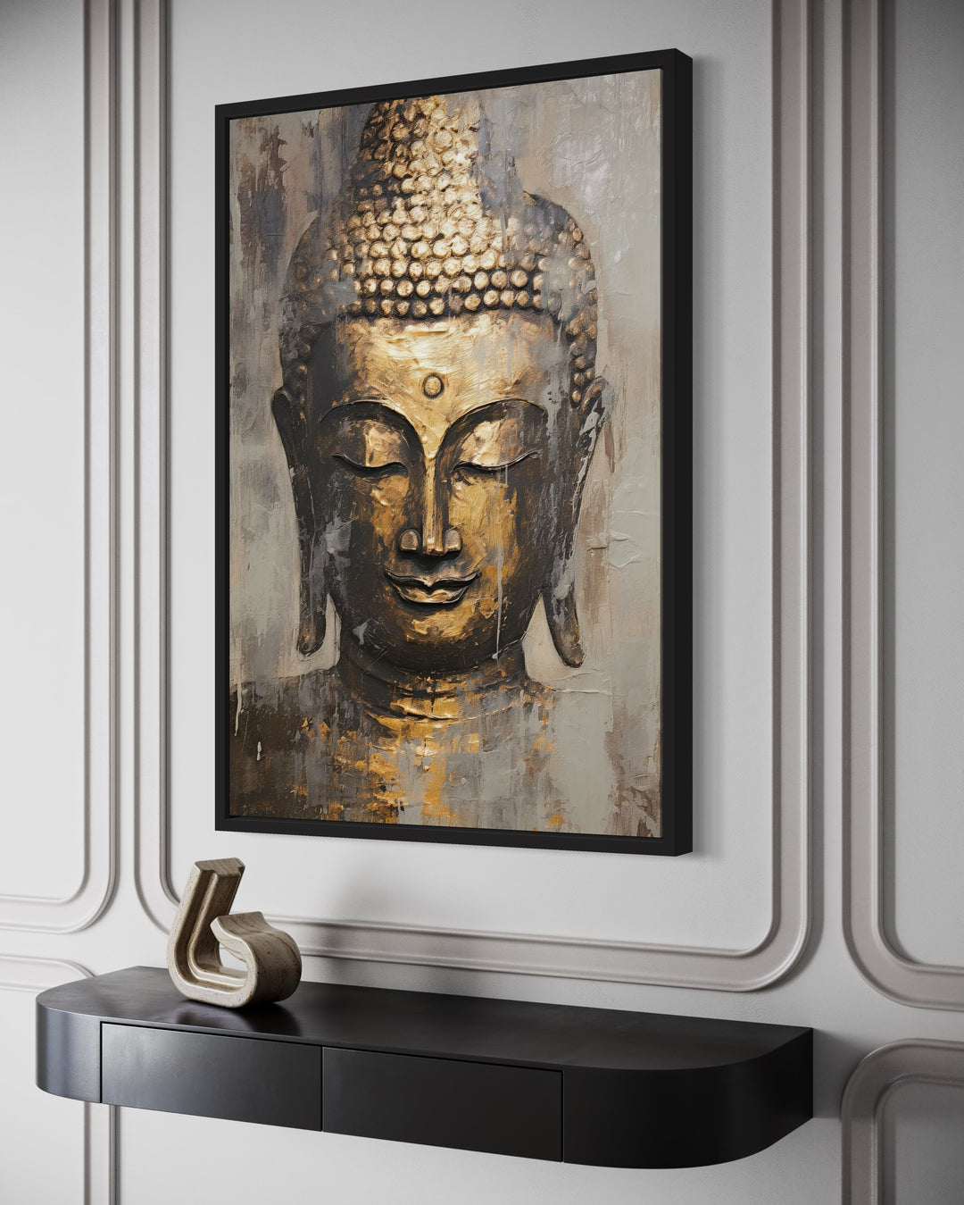 Golden Buddha Indian framed canvas wall art in a black frame above a dark console table.