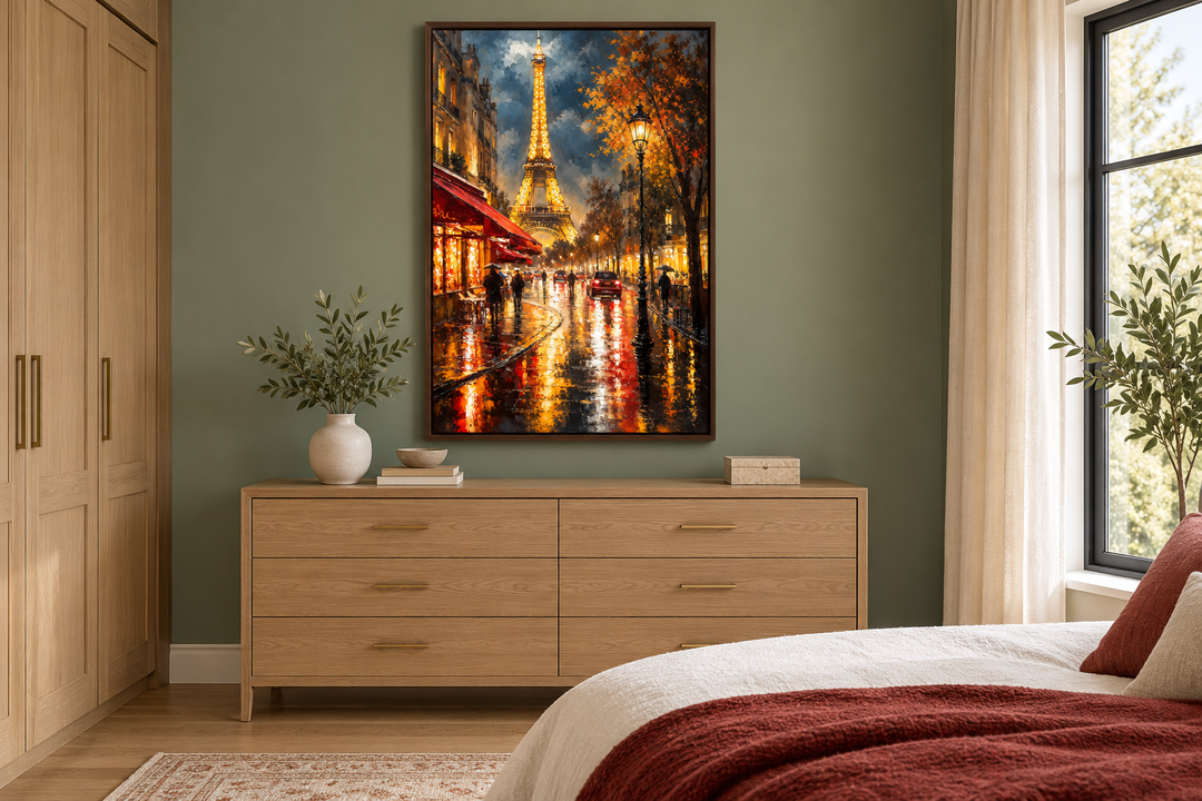 Framed oil painting of a rainy Paris street at night with the Eiffel Tower in a sage green bedroom.