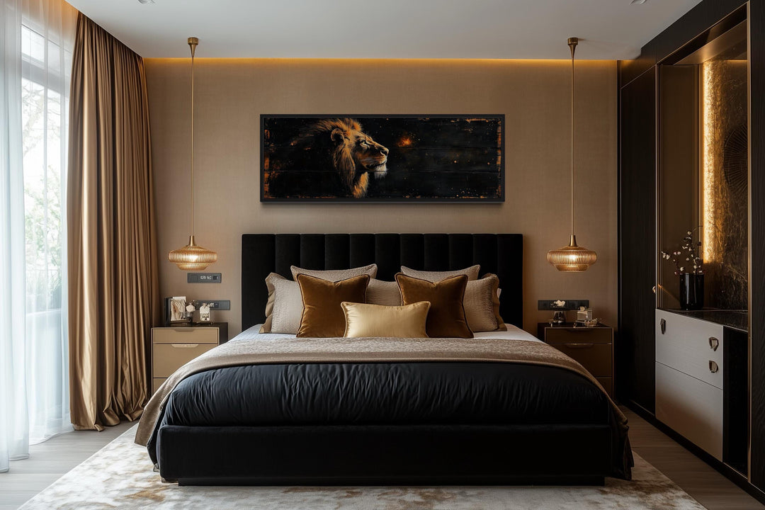 Golden lion horizontal canvas wall art centered above a black headboard in a modern bedroom.