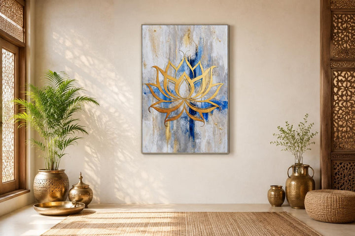 Golden lotus flower outline on abstract blue, gray, and gold background canvas wall art.