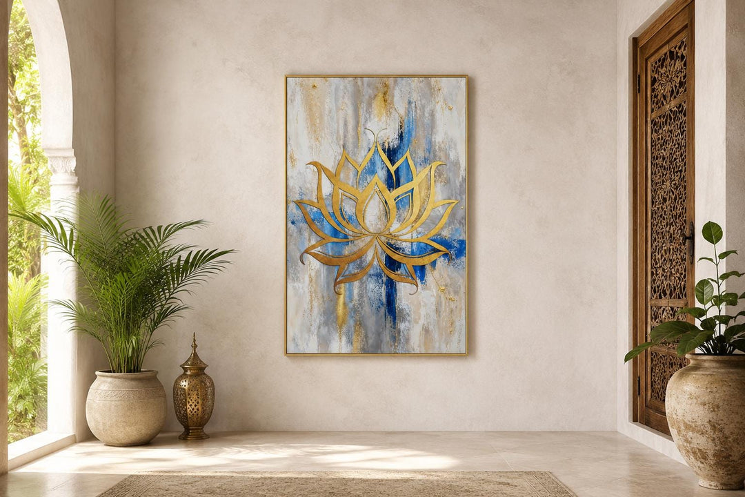 Golden lotus flower outline on abstract blue, gray, and gold background canvas wall art.