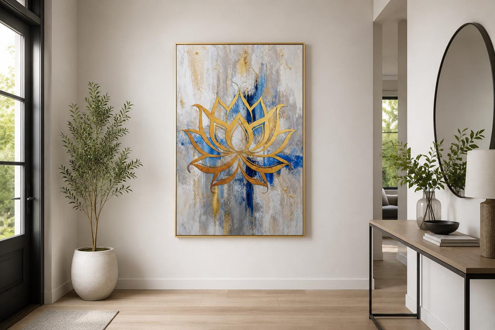 Golden lotus flower outline on abstract blue, gray, and gold background wall art in a modern room.