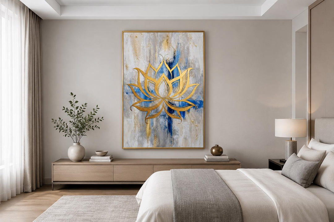 Golden lotus flower outline on an abstract blue, gray, and gold background canvas wall art.
