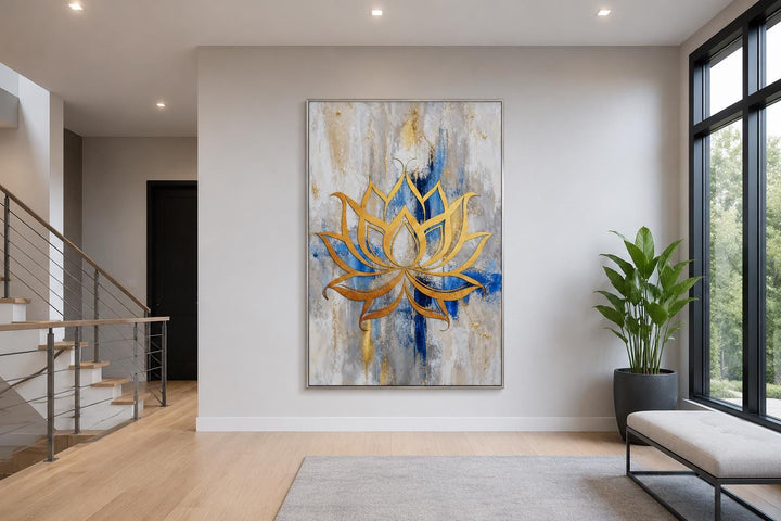 Golden lotus flower outline on abstract blue, gray, and gold background vertical wall art.