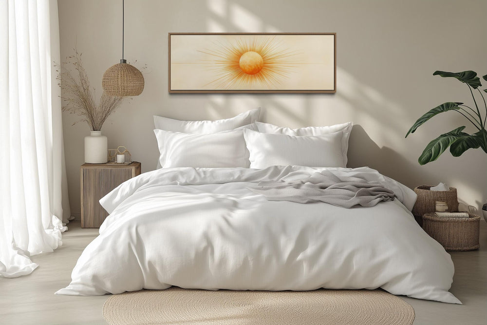 Golden Neutral Sun long horizontal celestial canvas wall art hanging above a bed in a neutral room.