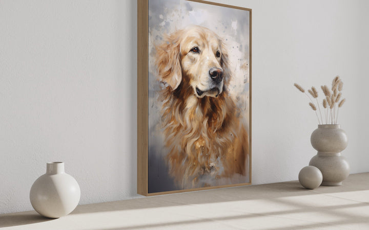 Framed abstract canvas wall art of a Golden Retriever portrait in warm gold and cream tones.