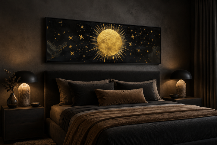 Golden sun and stars horizontal canvas wall art hanging above a bed in a dark, modern bedroom.