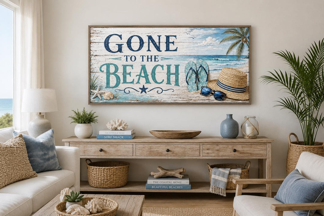 Gone To The Beach horizontal canvas print with coastal motifs above a wooden console table.