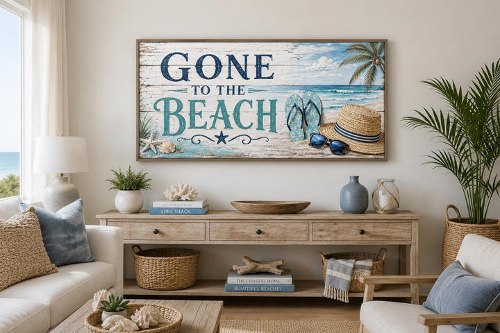 Gone To The Beach horizontal canvas print with coastal motifs above a wooden console table.