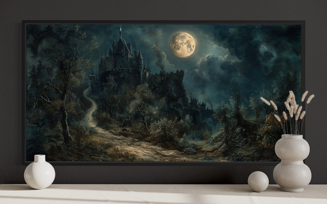 Framed gothic artwork of a dilapidated castle under a full moon with misty trees and a dark path.