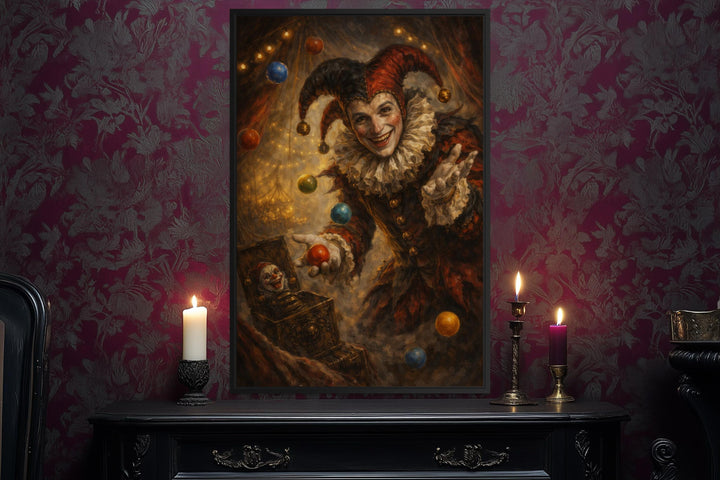 Gothic jester canvas print in a black frame displayed on a mantel with candles and dark wallpaper.