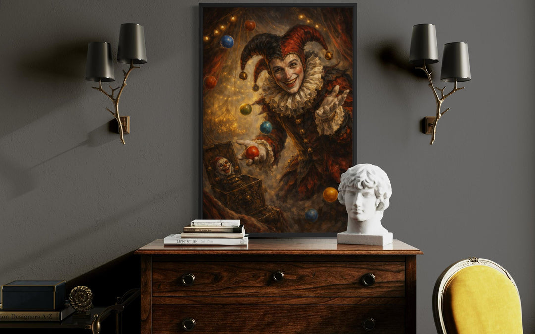 Gothic jester canvas print in a black frame, styled on a dark wall between two branch-like sconces.