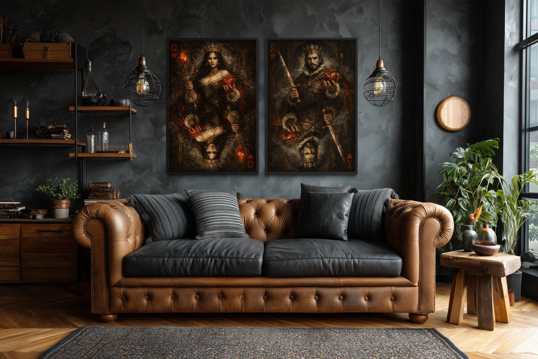 Gothic King and Queen of Hearts wall art set of two displayed above a brown leather sofa.