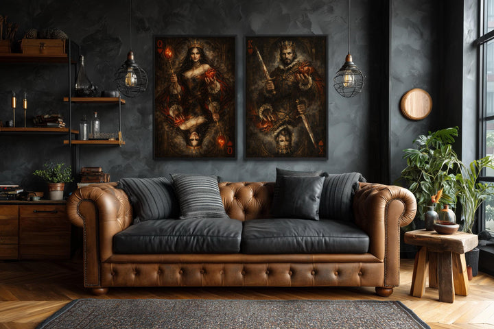 Gothic King and Queen of Hearts wall art set of two displayed above a brown leather sofa.