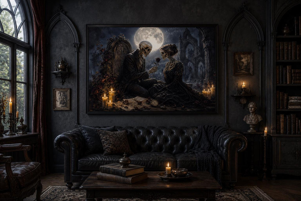 Gothic skeleton couple art canvas hanging above a black leather sofa in a dark academia room.
