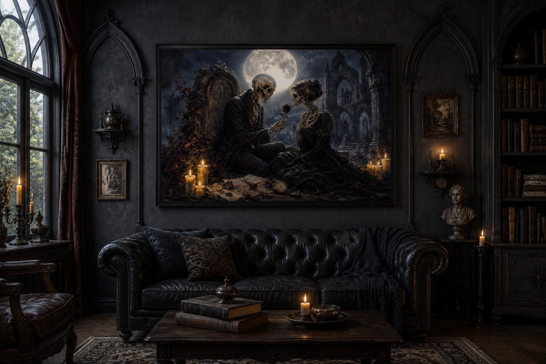Gothic skeleton couple art canvas hanging above a black leather sofa in a dark academia room.