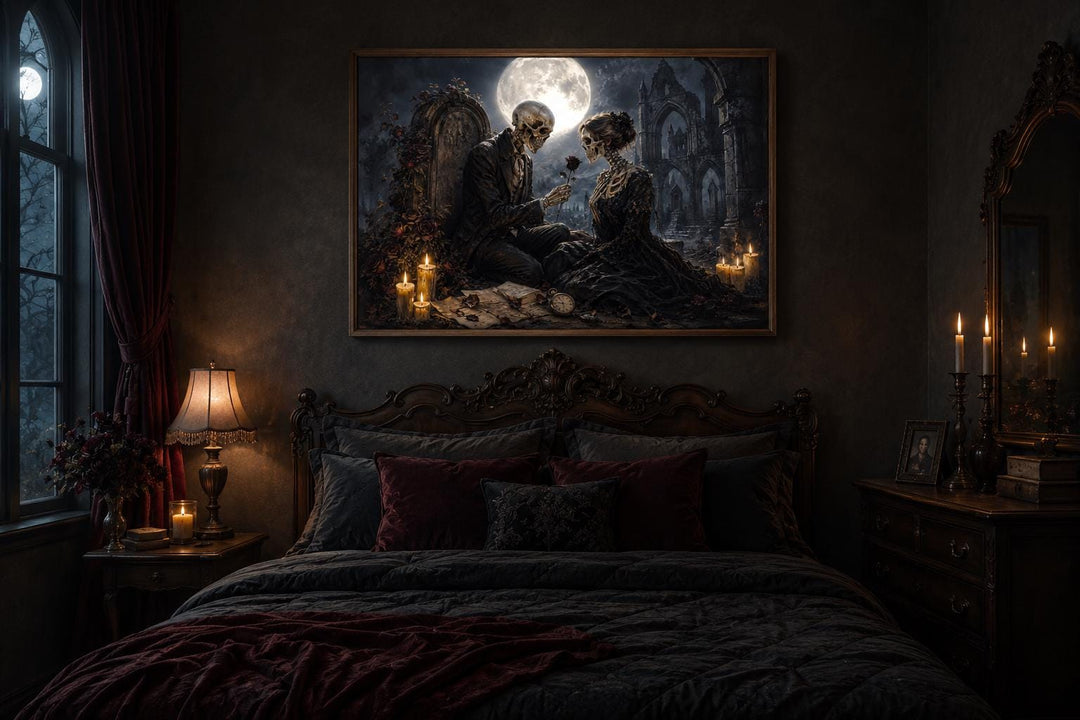 Gothic skeleton couple canvas art above a dark bed in a moody, candlelit bedroom.